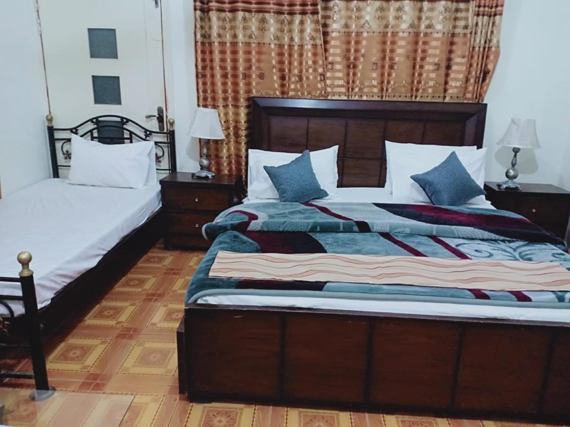Pyramid International Guest House อิสลามาบัด ภายนอก รูปภาพ